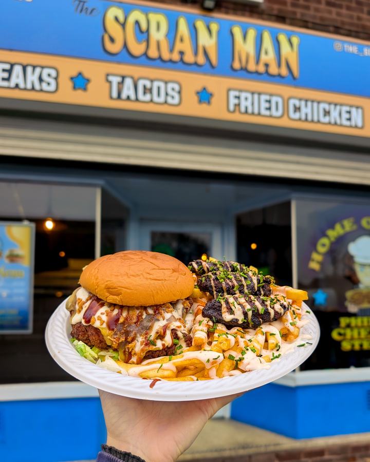 A crispy chicken burger with loaded seasoned fries